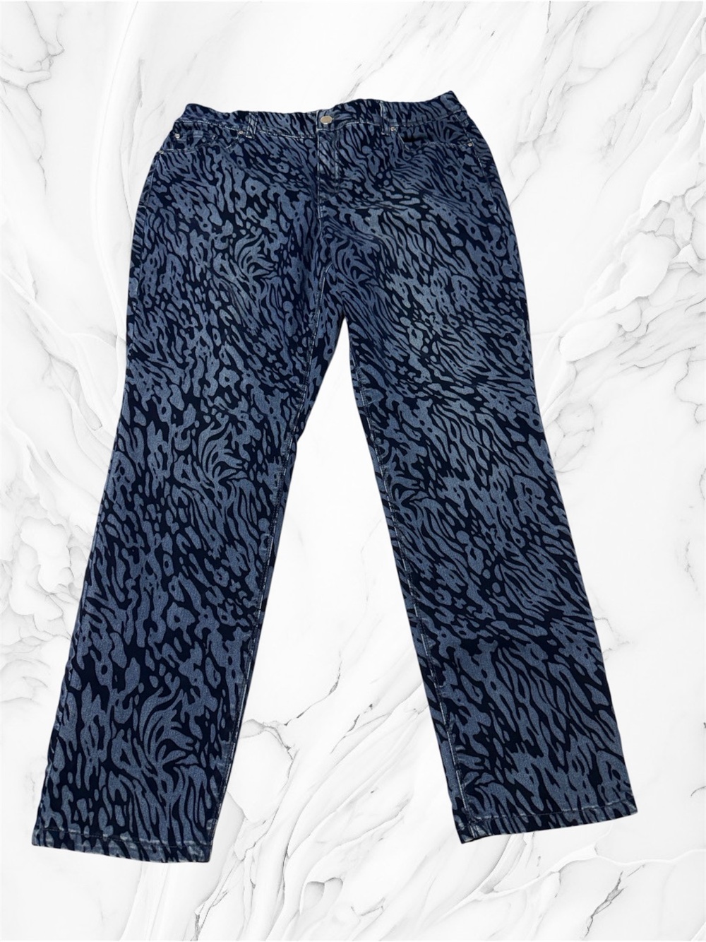Chico's Platinum blue jeans featuring a dark velvet-flocked animal print pattern